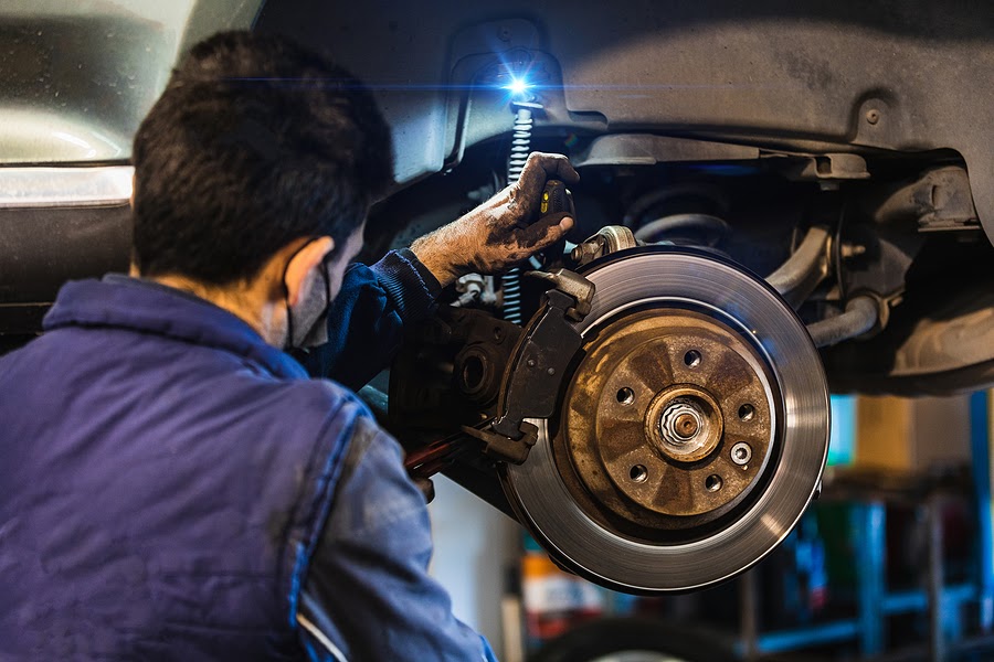 Mechanic-Repairing-Brakes